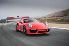 2017-Porsche-911-Turbo-S-front-three-quarter-in-motion-01.webp