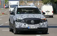 0a7669bc-mercedes-eq-c-major-camo-drop-3.webp
