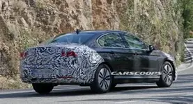 5861fec2-vw-passat-updated-5-300x163.webp
