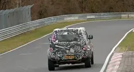 ffffd0ac-2020-land-rover-defender-spy-shots-at-the-nurburgring-31-300x163.webp