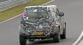 736cd3df-2020-land-rover-defender-spy-shots-at-the-nurburgring-30-300x163.webp