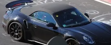 new-porsche-911-turbo-cabriolet-spotted-on-nurburgring-shows-widebody-look-134469-7.webp