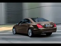 2009-mercedes-benz-s-class-s-600-rear-and-side-speed-1280x960.webp