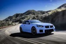 w-bmw-m2-zandvoort-blue-on-location-driving-2250px.webp